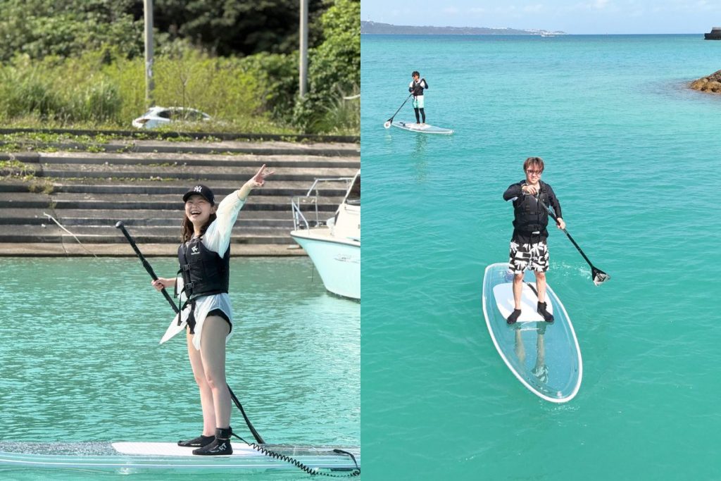 サップを漕ぎながら楽しそうな二人